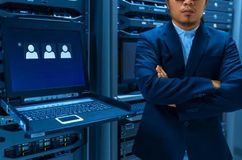 Man fix server network in data center room Stock Photos