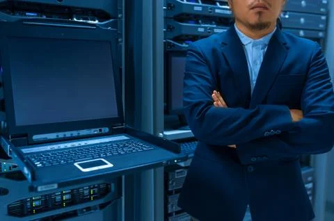 Man fix server network in data center room Stock Photos