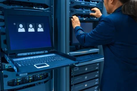 Man fix server network in data center room Stock Photos