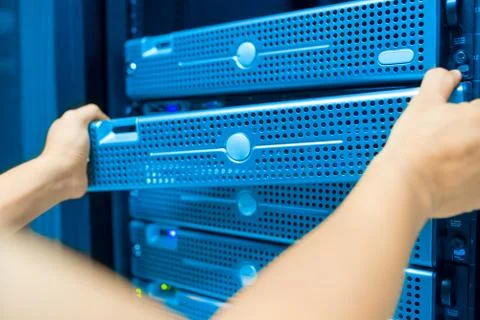 Man fix server network in data center room Stock Photos