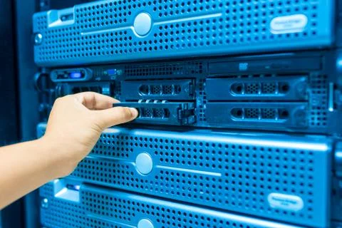 Man fix server network in data center room Stock Photos