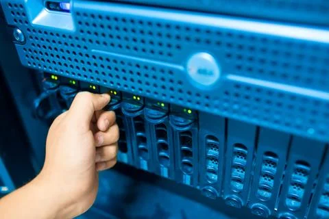 Man fix server network in data center room Stock Photos