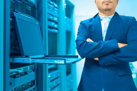 Man fix server network in data center room Stock Photos
