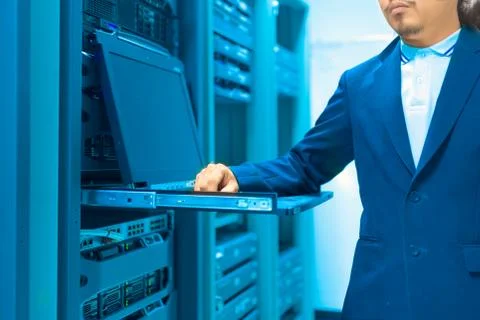 Man fix server network in data center room Stock Photos