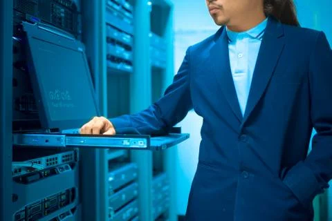 Man fix server network in data center room Stock Photos