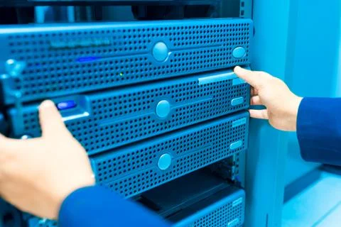 Man fix server network in data center room Stock Photos