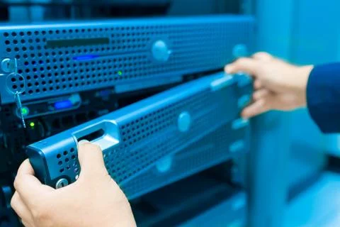 Man fix server network in data center room Stock Photos