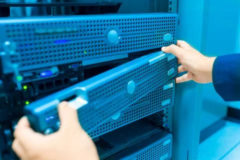 Man fix server network in data center room Stock Photos