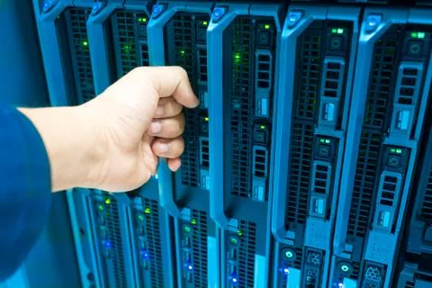 Man fix server network in data center room Stock Photos