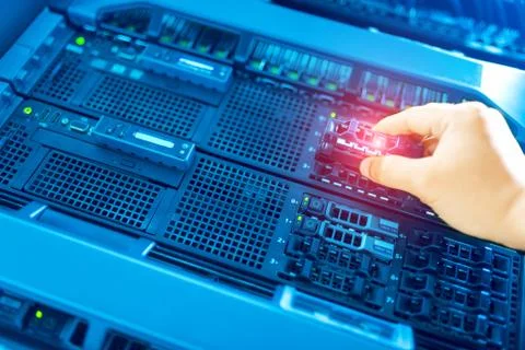 Man fix server network in data center room Stock Photos