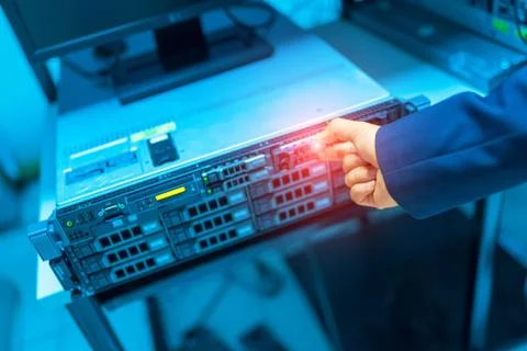 Man fix server network in data center room Stock Photos