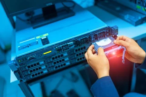Man fix server network in data center room Stock Photos