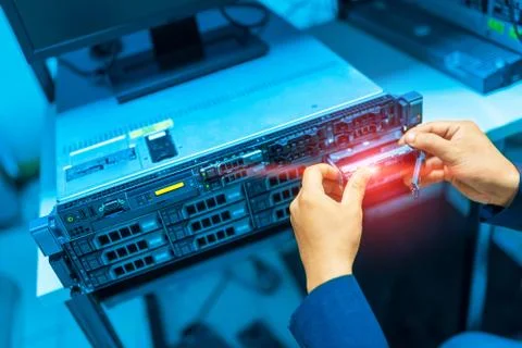 Man fix server network in data center room Stock Photos