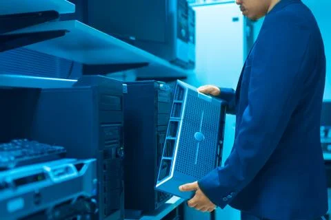 Man fix server network in data center room Stock Photos