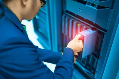 Man fix server network in data center room Stock Photos