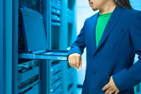 Man fix server network in data center room Stock Photos