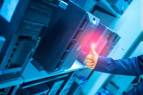 Man fix server network in data center room Stock Photos