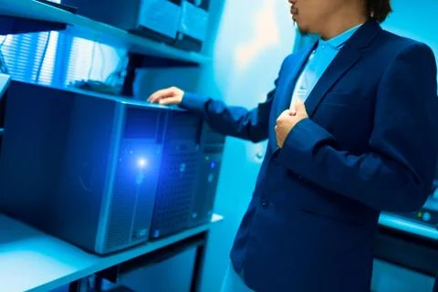 Man fix server network in data center room Stock Photos