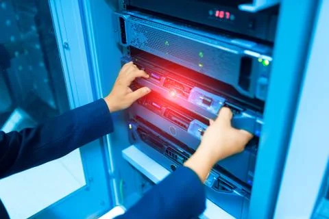 Man fix server network in data center room Stock Photos