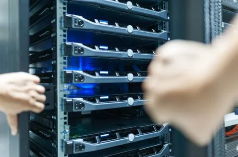 Man fix server network in data center room Stock Photos