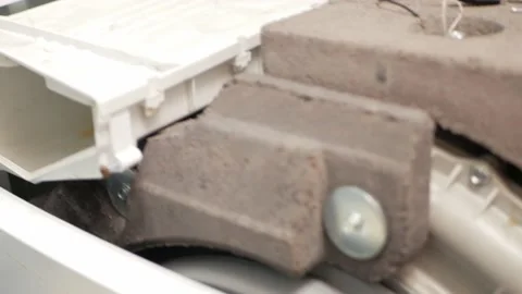 Man fixes washing machine, repairs, broken, destroyed. Bathroom, tools, repair Stock Footage 168375578