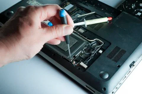 Man fixing computer Stock Photos