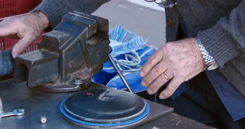 Man Fixing Cookware Pan. Street Market. Sao Paulo, Brazil Stock Footage 140209750