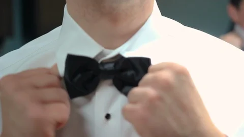 Man fixing loose bow tie close up Stock-Footage 87296487