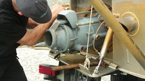 Man fixing a machine part Stock Footage 83181159