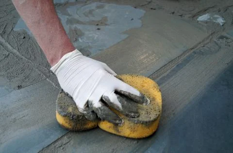 Man Fixing Sidewalk Stock Photos