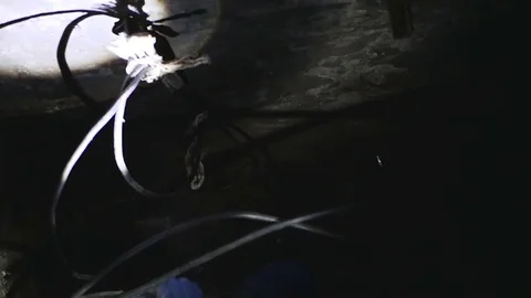 Man with a flashlight on his head Stock Footage 74121745