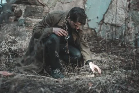 Man with flashlight Stock Photos