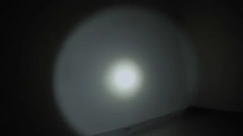 A man with a flashlight walks up the stairs, the elevator does not work because  Stock Footage 233027393