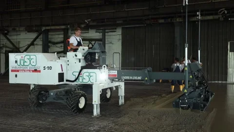 Man is flattening concrete using a machine 動画素材 152877273