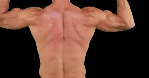 Man flexing his biceps 4k | Stock Video | Pond5