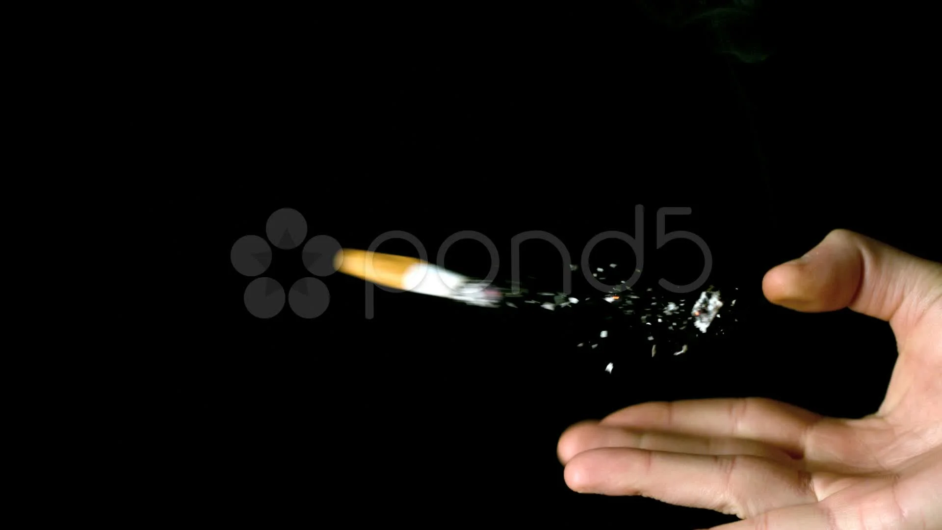 flicking cigarettes off in the sink Man flicking away cigarette butt close up