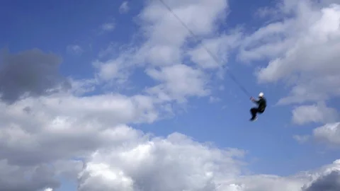 Man flies in the clouds Video stock 95578920