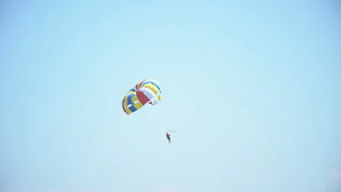 Man flies by parachute Stock Footage 121113962