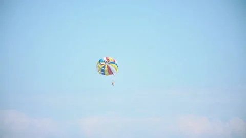 Man flies by parachute Stock Footage 121381532