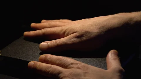 Man Flipping Pages Of an Old Book Stock Footage 129804802