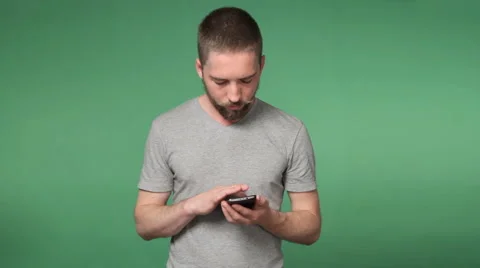 Man flipping the smartphone Stock Footage 67461788