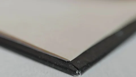 A man flips through pages in a book. Slowmotion, 180fps Stock Footage 86283526