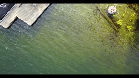 Man Floating on beautiful lake Stock Footage