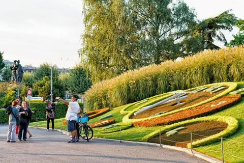 Man at Flower Clock in Geneva Stock Photos