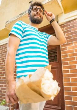 Man with flowers Stock Photos