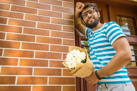 Man with flowers Stock Photos