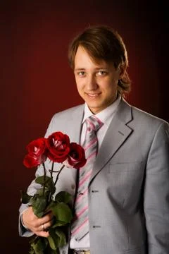 Man with flowers Stock Photos