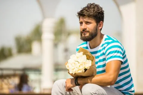 Man with flowers Stock Photos