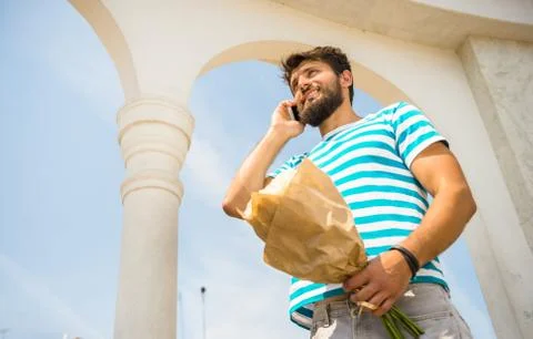 Man with flowers Stock Photos