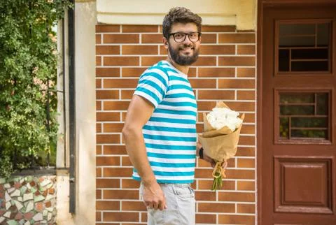 Man with flowers Stock Photos